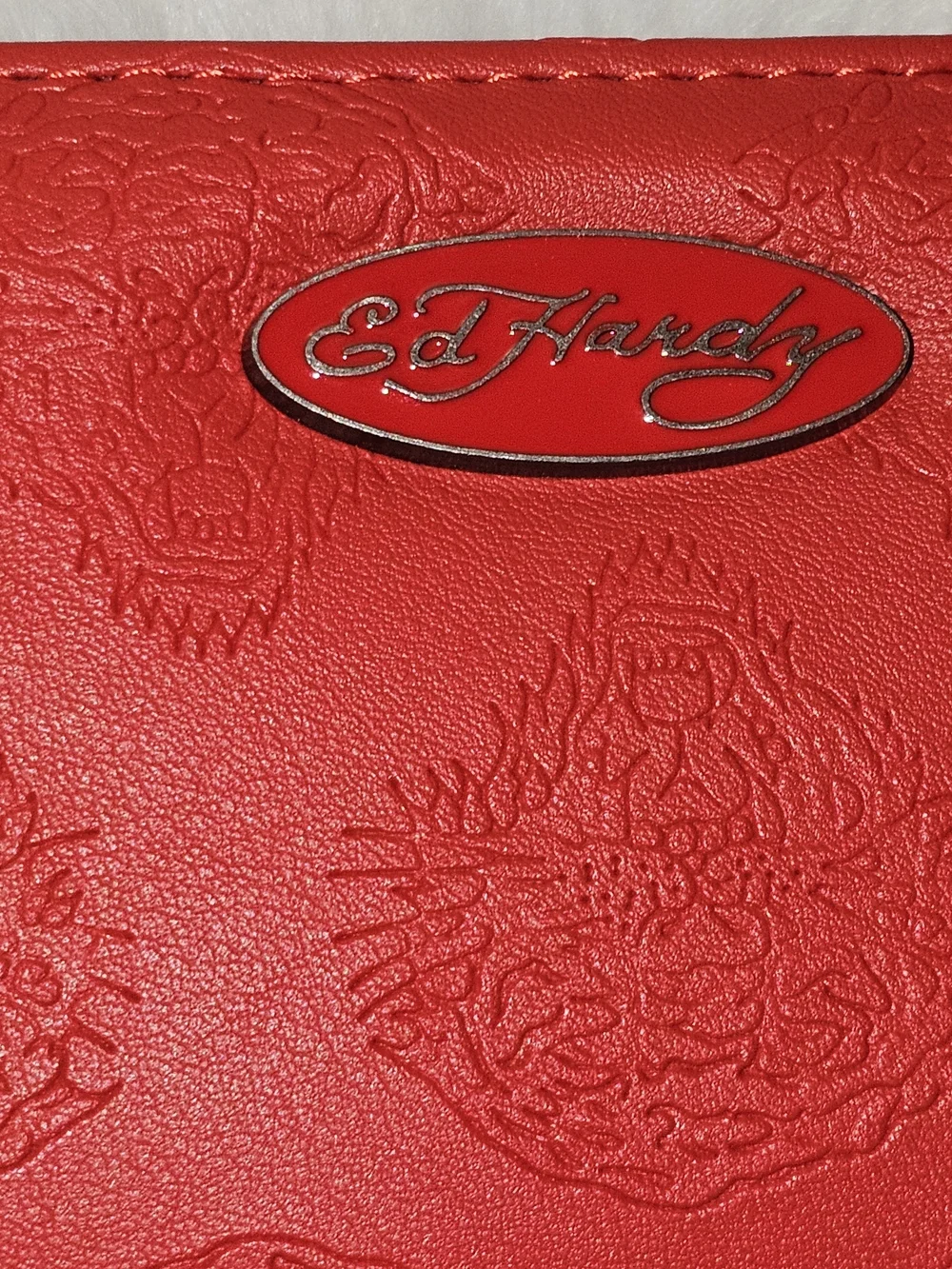 Ed Hardy Red Embossed Zip Clutch